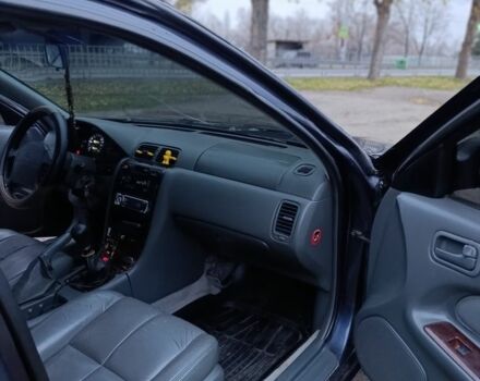 Синий Ниссан Максима, объемом двигателя 3 л и пробегом 359 тыс. км за 2300 $, фото 11 на Automoto.ua