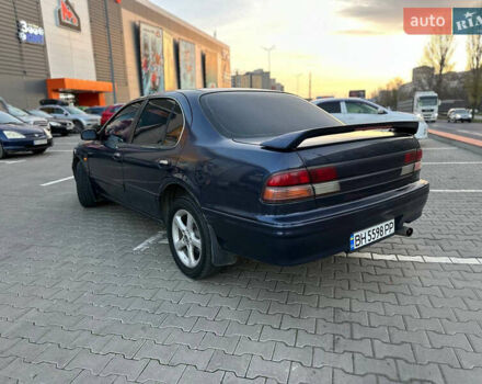 Синий Ниссан Максима, объемом двигателя 2 л и пробегом 350 тыс. км за 2100 $, фото 2 на Automoto.ua