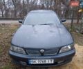 Синий Ниссан Максима, объемом двигателя 2.99 л и пробегом 500 тыс. км за 1300 $, фото 1 на Automoto.ua