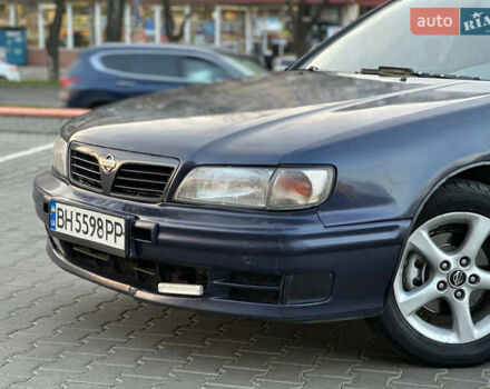 Синий Ниссан Максима, объемом двигателя 2 л и пробегом 350 тыс. км за 2100 $, фото 1 на Automoto.ua