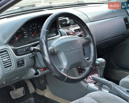 Синий Ниссан Максима, объемом двигателя 2 л и пробегом 350 тыс. км за 2100 $, фото 6 на Automoto.ua