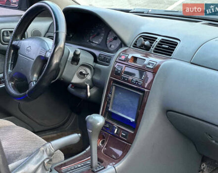 Синий Ниссан Максима, объемом двигателя 2 л и пробегом 350 тыс. км за 2100 $, фото 7 на Automoto.ua