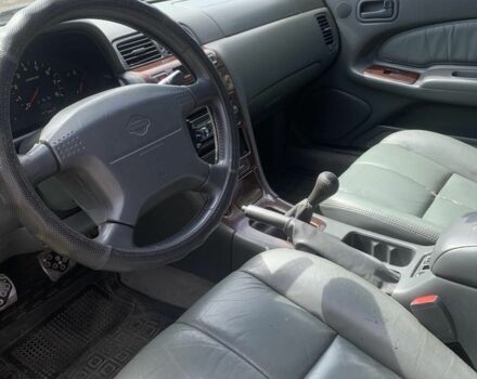 Синій Ніссан Максіма, об'ємом двигуна 3 л та пробігом 300 тис. км за 2300 $, фото 4 на Automoto.ua