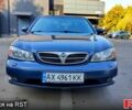 Синий Ниссан Максима, объемом двигателя 2 л и пробегом 243 тыс. км за 4900 $, фото 1 на Automoto.ua