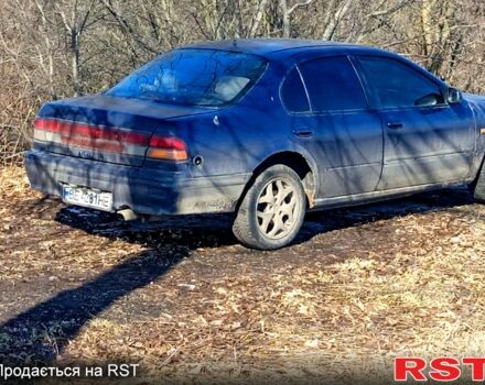 Синий Ниссан Максима, объемом двигателя 2 л и пробегом 306 тыс. км за 2000 $, фото 1 на Automoto.ua