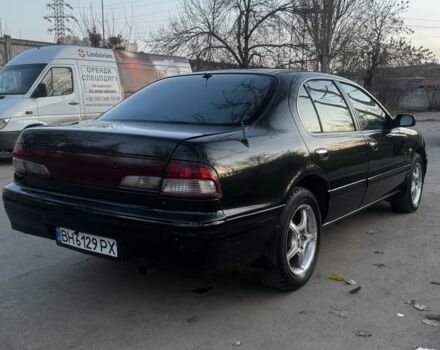 Зеленый Ниссан Максима, объемом двигателя 2 л и пробегом 224 тыс. км за 1950 $, фото 8 на Automoto.ua