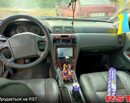 Зелений Ніссан Максіма, об'ємом двигуна 2 л та пробігом 300 тис. км за 2550 $, фото 3 на Automoto.ua