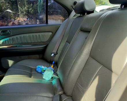 Зелений Ніссан Максіма, об'ємом двигуна 2 л та пробігом 300 тис. км за 2550 $, фото 4 на Automoto.ua