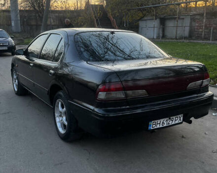 Зеленый Ниссан Максима, объемом двигателя 2 л и пробегом 225 тыс. км за 1950 $, фото 12 на Automoto.ua