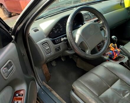 Зелений Ніссан Максіма, об'ємом двигуна 2 л та пробігом 300 тис. км за 2550 $, фото 2 на Automoto.ua