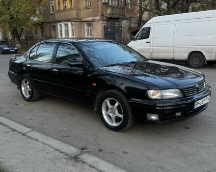 Зеленый Ниссан Максима, объемом двигателя 2 л и пробегом 224 тыс. км за 1950 $, фото 7 на Automoto.ua