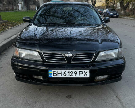 Зеленый Ниссан Максима, объемом двигателя 2 л и пробегом 225 тыс. км за 1950 $, фото 5 на Automoto.ua