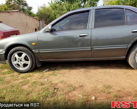 Зелений Ніссан Максіма, об'ємом двигуна 2 л та пробігом 300 тис. км за 2550 $, фото 5 на Automoto.ua