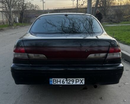 Зеленый Ниссан Максима, объемом двигателя 2 л и пробегом 224 тыс. км за 1950 $, фото 10 на Automoto.ua