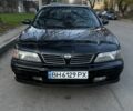 Зеленый Ниссан Максима, объемом двигателя 2 л и пробегом 224 тыс. км за 1950 $, фото 4 на Automoto.ua