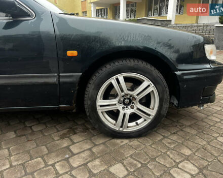 Зелений Ніссан Максіма, об'ємом двигуна 2 л та пробігом 200 тис. км за 1800 $, фото 5 на Automoto.ua