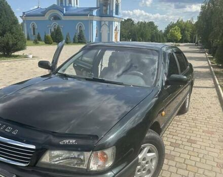 Зеленый Ниссан Максима, объемом двигателя 3 л и пробегом 281 тыс. км за 4200 $, фото 1 на Automoto.ua