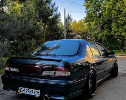 Зеленый Ниссан Максима, объемом двигателя 2 л и пробегом 277 тыс. км за 8300 $, фото 4 на Automoto.ua