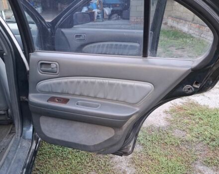 Зелений Ніссан Максіма, об'ємом двигуна 2 л та пробігом 290 тис. км за 1024 $, фото 22 на Automoto.ua