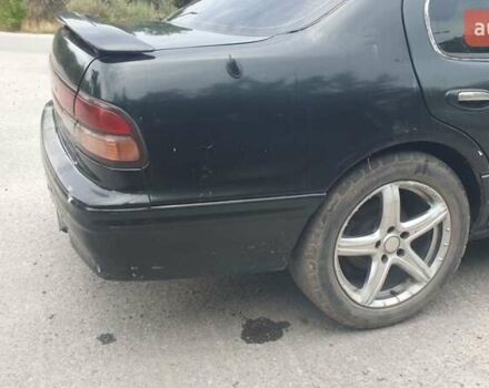 Зелений Ніссан Максіма, об'ємом двигуна 3 л та пробігом 370 тис. км за 2250 $, фото 12 на Automoto.ua