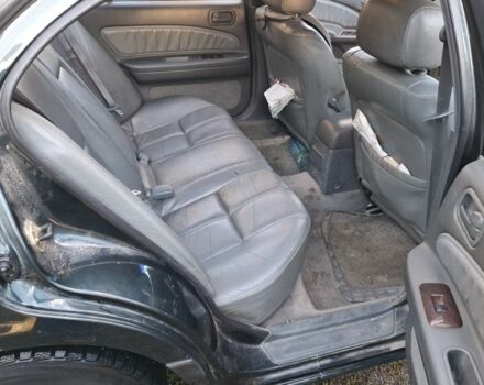 Зелений Ніссан Максіма, об'ємом двигуна 2 л та пробігом 290 тис. км за 1024 $, фото 19 на Automoto.ua