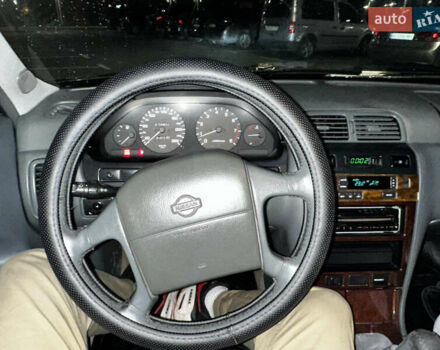 Зеленый Ниссан Максима, объемом двигателя 2 л и пробегом 280 тыс. км за 2400 $, фото 16 на Automoto.ua