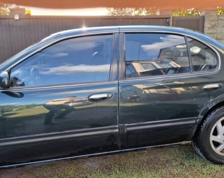 Зелений Ніссан Максіма, об'ємом двигуна 2 л та пробігом 290 тис. км за 1024 $, фото 9 на Automoto.ua