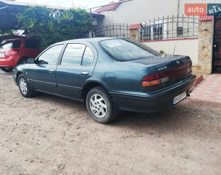 Зелений Ніссан Максіма, об'ємом двигуна 3 л та пробігом 350 тис. км за 3200 $, фото 6 на Automoto.ua