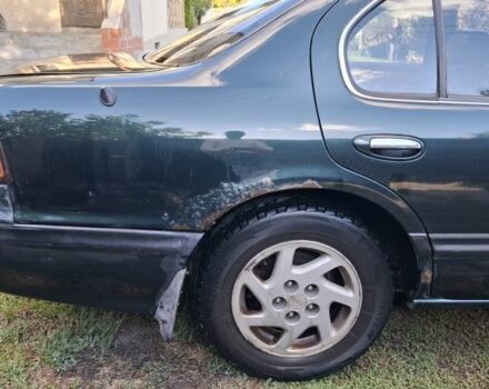 Зелений Ніссан Максіма, об'ємом двигуна 2 л та пробігом 290 тис. км за 1024 $, фото 5 на Automoto.ua