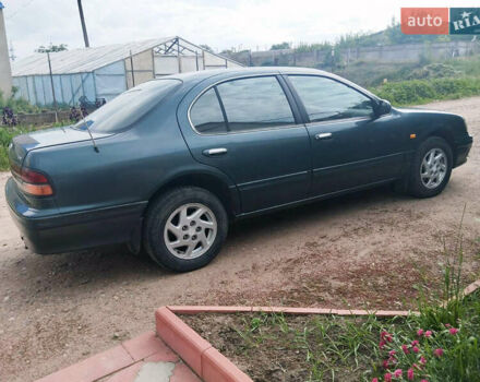 Зелений Ніссан Максіма, об'ємом двигуна 3 л та пробігом 350 тис. км за 3200 $, фото 4 на Automoto.ua