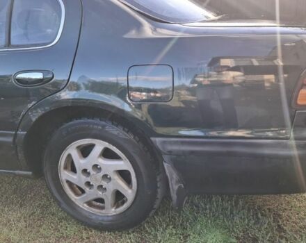 Зелений Ніссан Максіма, об'ємом двигуна 2 л та пробігом 290 тис. км за 1024 $, фото 4 на Automoto.ua