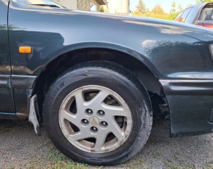 Зелений Ніссан Максіма, об'ємом двигуна 2 л та пробігом 290 тис. км за 1024 $, фото 15 на Automoto.ua