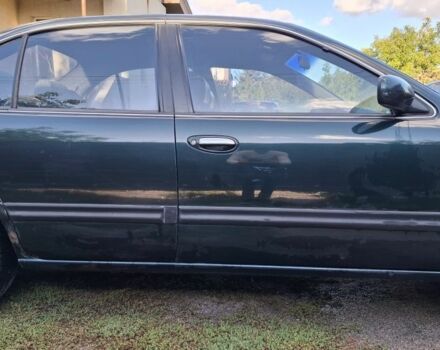 Зелений Ніссан Максіма, об'ємом двигуна 2 л та пробігом 290 тис. км за 1024 $, фото 6 на Automoto.ua