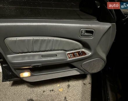 Зеленый Ниссан Максима, объемом двигателя 2 л и пробегом 280 тыс. км за 2400 $, фото 7 на Automoto.ua