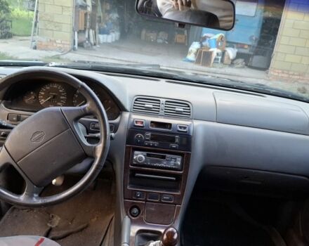 Зелений Ніссан Максіма, об'ємом двигуна 2 л та пробігом 290 тис. км за 1024 $, фото 12 на Automoto.ua