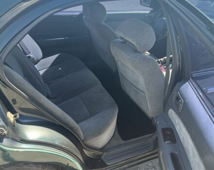 Зелений Ніссан Максіма, об'ємом двигуна 2 л та пробігом 410 тис. км за 800 $, фото 6 на Automoto.ua