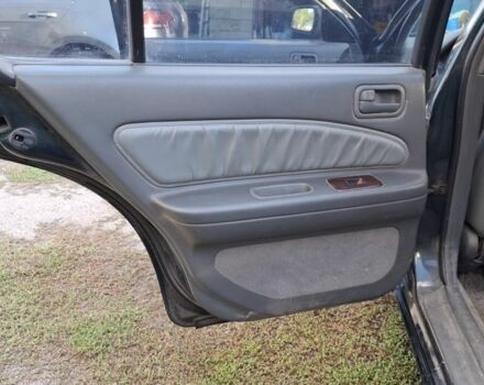 Зелений Ніссан Максіма, об'ємом двигуна 2 л та пробігом 290 тис. км за 1024 $, фото 17 на Automoto.ua