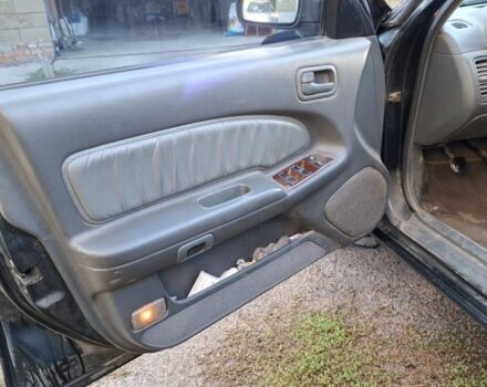 Зелений Ніссан Максіма, об'ємом двигуна 2 л та пробігом 290 тис. км за 1024 $, фото 16 на Automoto.ua