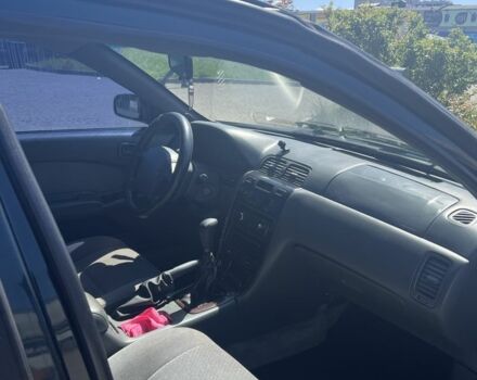 Зелений Ніссан Максіма, об'ємом двигуна 2 л та пробігом 410 тис. км за 800 $, фото 5 на Automoto.ua