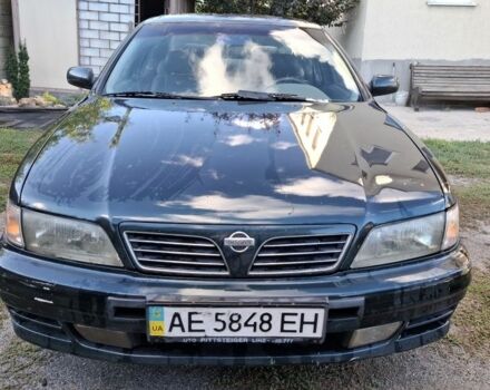 Зелений Ніссан Максіма, об'ємом двигуна 2 л та пробігом 290 тис. км за 1024 $, фото 7 на Automoto.ua