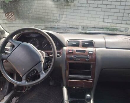 Зелений Ніссан Максіма, об'ємом двигуна 2.99 л та пробігом 381 тис. км за 2100 $, фото 8 на Automoto.ua