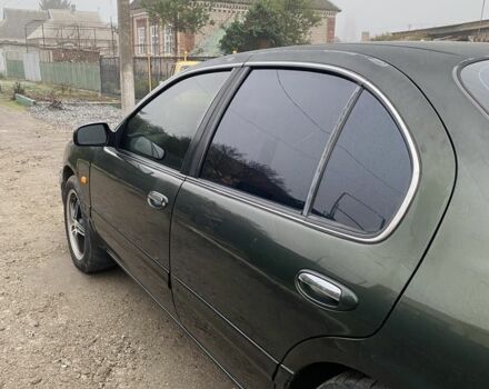 Зеленый Ниссан Максима, объемом двигателя 3 л и пробегом 220 тыс. км за 2700 $, фото 5 на Automoto.ua