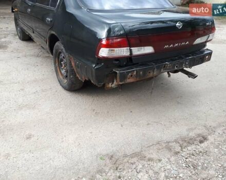 Зеленый Ниссан Максима, объемом двигателя 3 л и пробегом 327 тыс. км за 1670 $, фото 6 на Automoto.ua