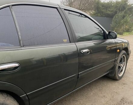 Зеленый Ниссан Максима, объемом двигателя 3 л и пробегом 220 тыс. км за 2700 $, фото 4 на Automoto.ua