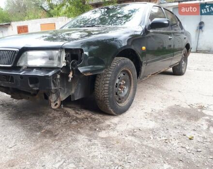 Зеленый Ниссан Максима, объемом двигателя 3 л и пробегом 327 тыс. км за 1670 $, фото 8 на Automoto.ua