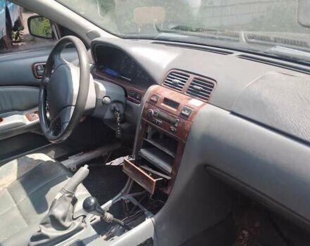 Зелений Ніссан Максіма, об'ємом двигуна 2.99 л та пробігом 381 тис. км за 2100 $, фото 5 на Automoto.ua