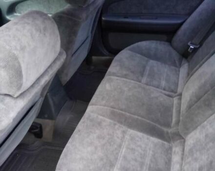 Зеленый Ниссан Максима, объемом двигателя 3 л и пробегом 327 тыс. км за 1670 $, фото 2 на Automoto.ua