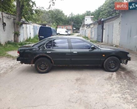 Зеленый Ниссан Максима, объемом двигателя 3 л и пробегом 327 тыс. км за 1670 $, фото 7 на Automoto.ua