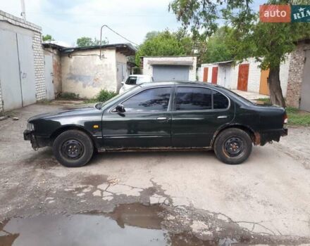 Зеленый Ниссан Максима, объемом двигателя 3 л и пробегом 327 тыс. км за 1670 $, фото 5 на Automoto.ua