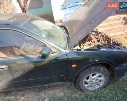 Зеленый Ниссан Максима, объемом двигателя 3 л и пробегом 400 тыс. км за 1200 $, фото 7 на Automoto.ua
